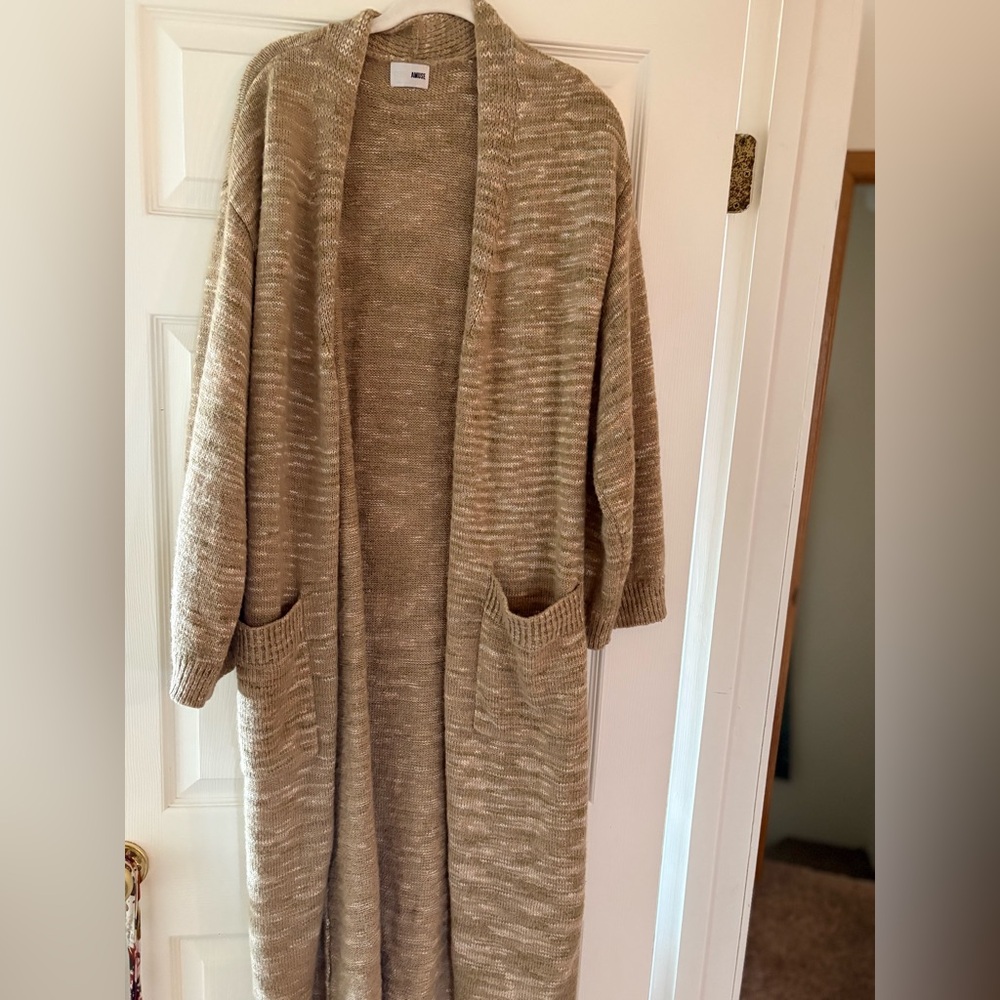 Long cardigan in taupe size small but fits like a medium. Worn once